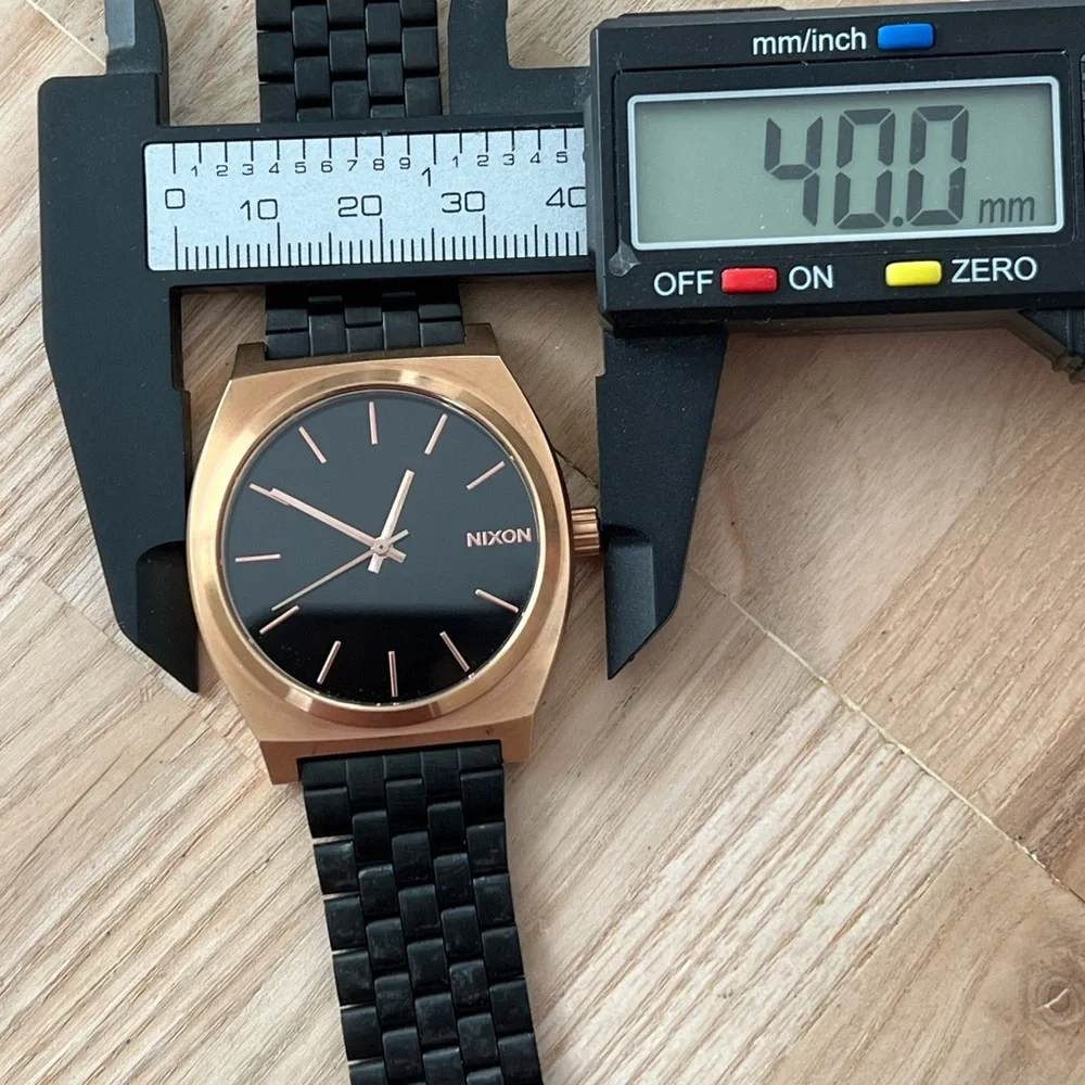 Nixon Minimal Time Traveler Black and Rose Gold Watch Adjustable Black Bracelet